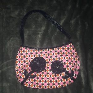 Mini Vera Bradley bag.
